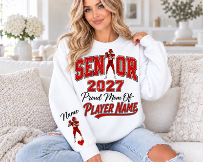 White sweatshirt with red printed glitter — Senior Mom 2027 quarterback and personalized sleeve