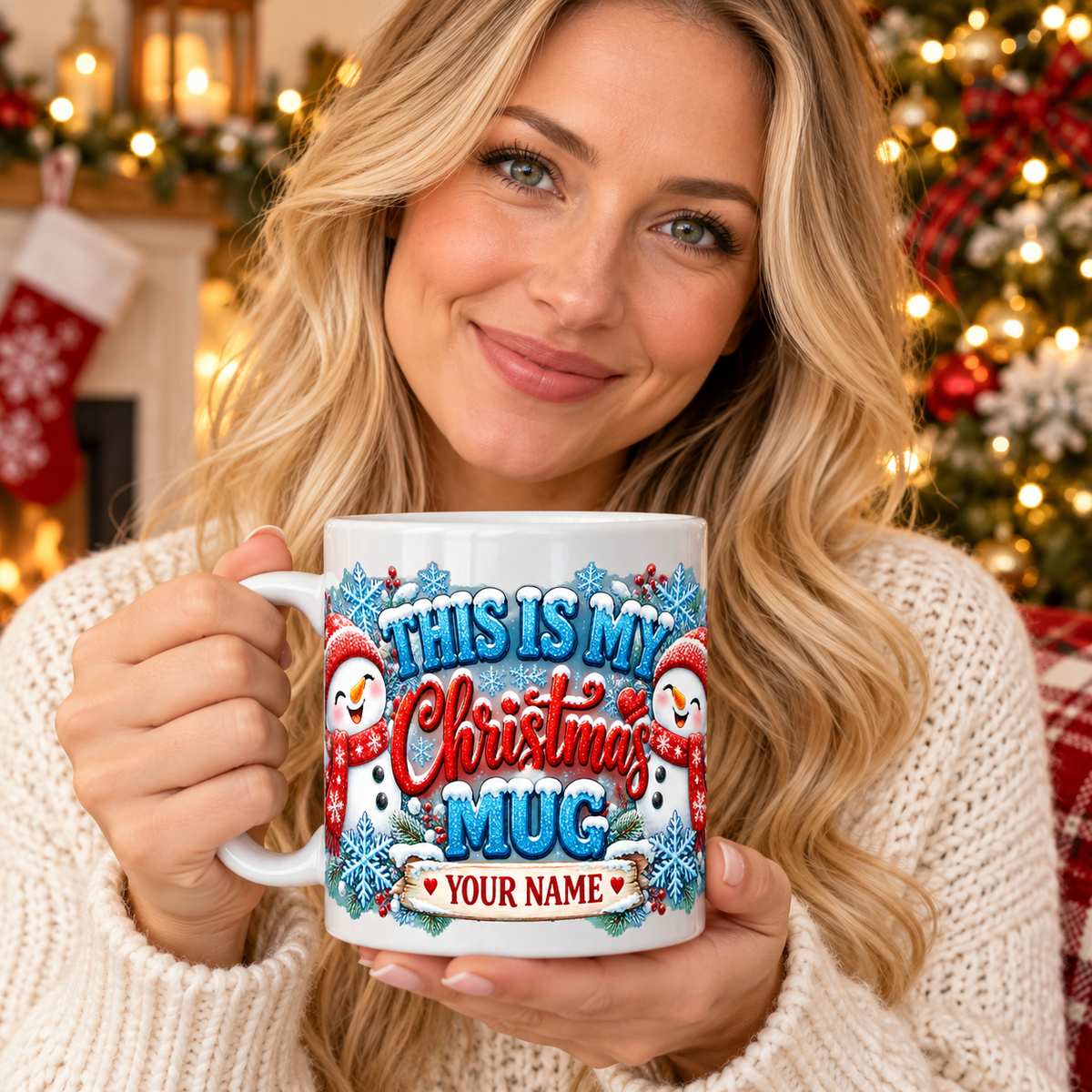 Blonde woman holding personalized snowmen Christmas mug — example name